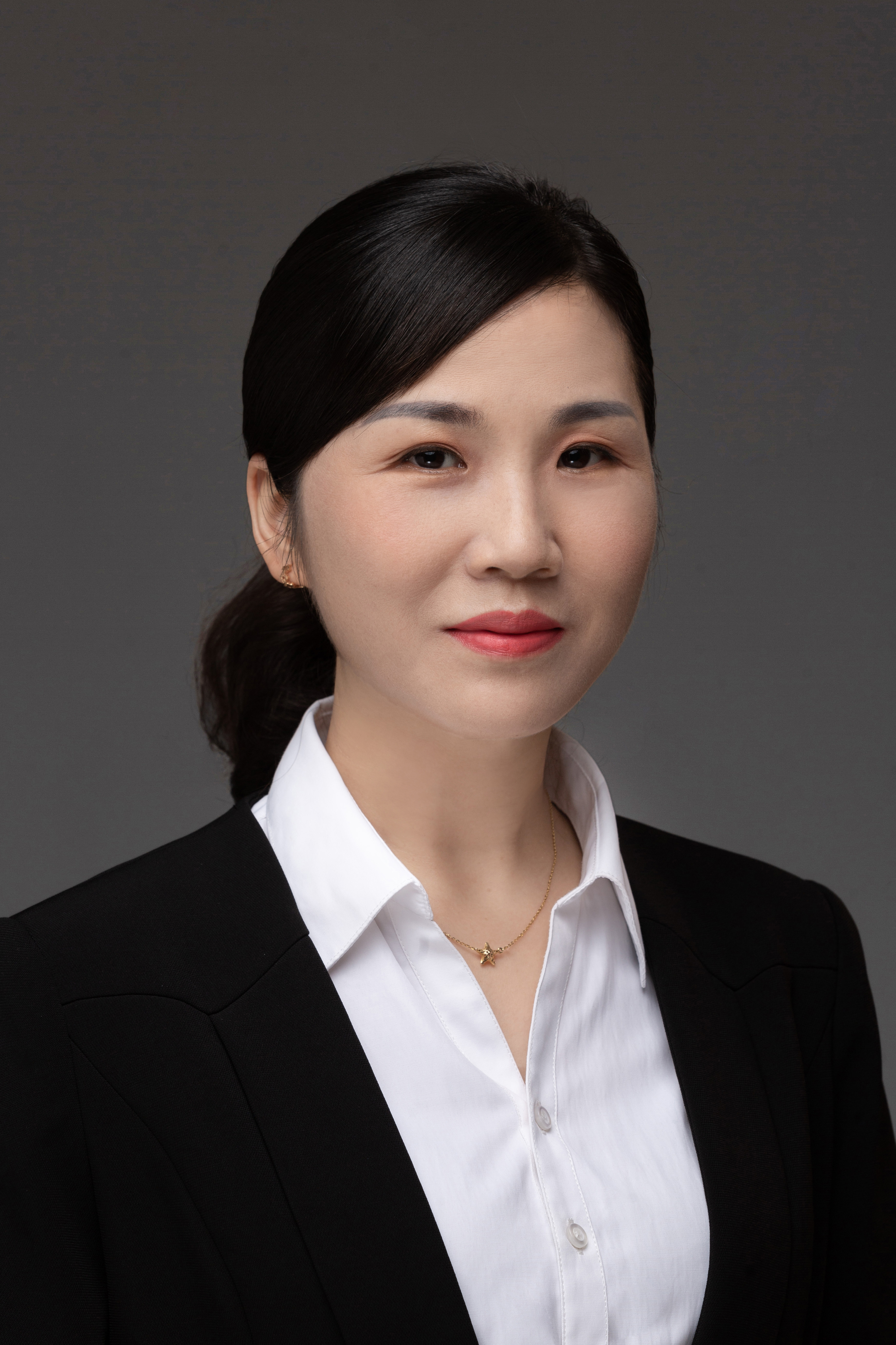 ?何麗華